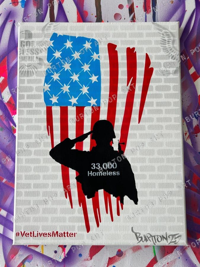 Stencil of a saluting soldier over an American flag, captioned 33,000 Homeless, with #VetLivesMatter.